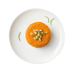 Plate with tasty mashed sweet potato, rosemary and walnuts isolated on white, top view