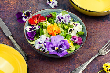Colorful edible flower salad.