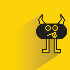 funny monster icon with shadow on yellow background