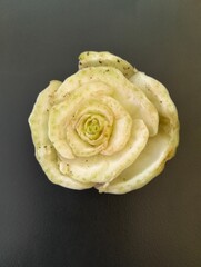 Obraz premium A bok choy cut that looks like a green rose, unique, fresh, and beautiful