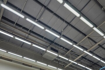 Fluorescent Lamps on Warehouse Ceiling.