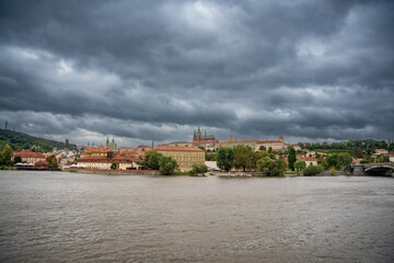 Obraz premium Flood in Prague. View of Prague Castle across the flooding river Vltava, Prague