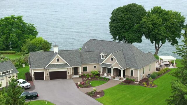 Upscale suburban home on lake Ontario waterfront area in Rochester, NY. Private residential house in rural suburban sprawl in upstate New York