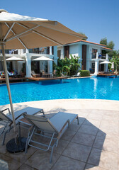 Swimming pool. Summer vacation at poolside. swimming pool in resort hotel for vacation leisure