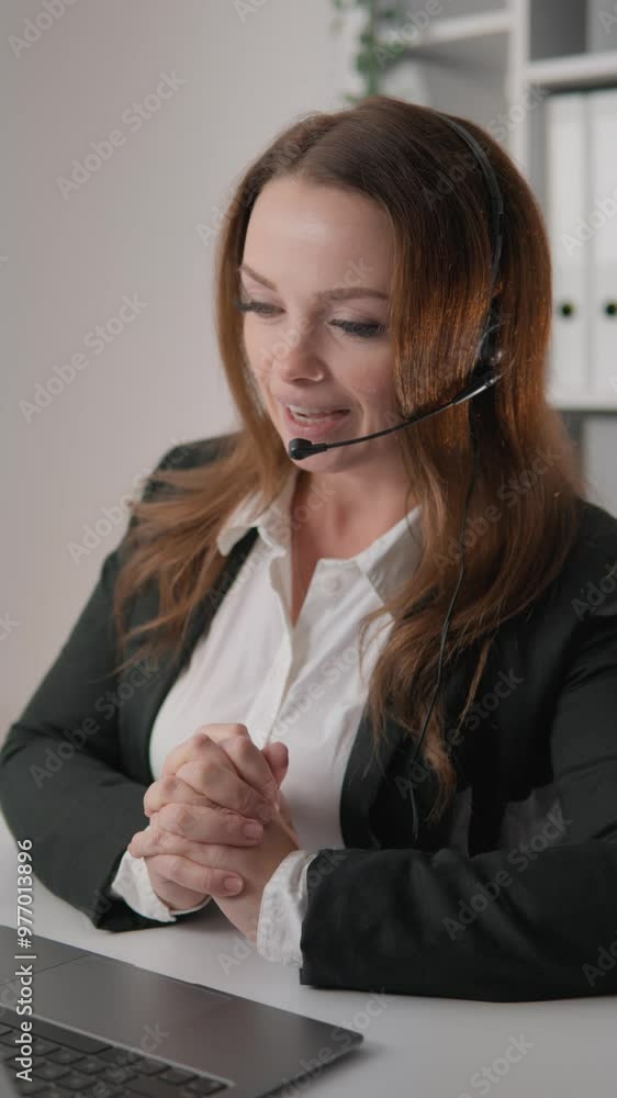Poster in an office environment, a determined businesswoman with a headset highlights the importance of com