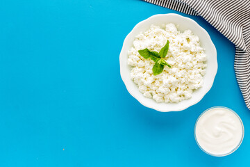 Farm cottage cheese in a bowl, top view. Healthy breakfast