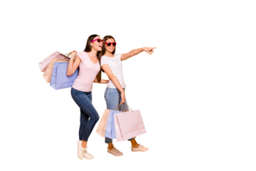 Full length body size view portrait of nice cute charming attractive dreamy cheerful cheery straight-haired teenage girls carrying new purchase isolated on bright vivid shine yellow background