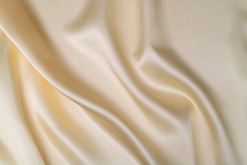 Close up of beige silk background