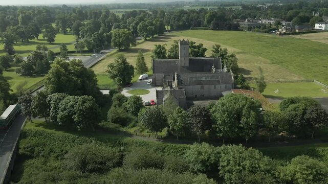 Adare Friary - St Nicholas' Church of Ireland In Town Of Adare, County Limerick. aerial shot