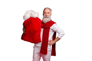 Stylish aged man improvisation modern santa with large bag wear sweater white pants isolated red...