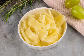 Parmesan cheese slices in the bowl