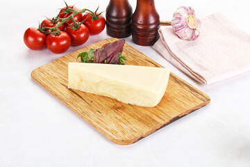 Piece Italian hard parmesan cheese