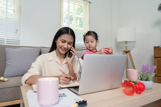 Multi tasking Mother Balances Remote Work and Childcare Using Tech Tools