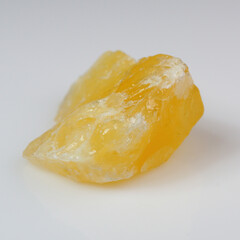 Radiant Yellow Calcite Crystal on Pristine White Background