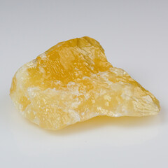 Vibrant Yellow Calcite Crystal on Pristine White Background