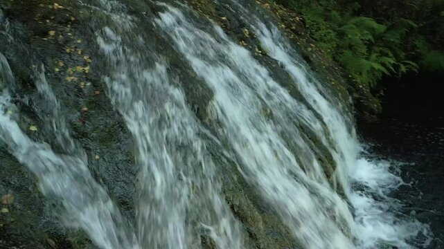 Drone footage of the scenic Parga Waterfall during daytime in Parga, A Coruna, Galicia, Spain