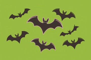 Fototapeta premium Spooky Black Bats on Vibrant Green Background - Halloween Graphic Design for Decor and Party Themes