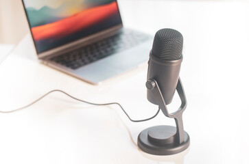 podcasts recording equipment: microphone and laptop