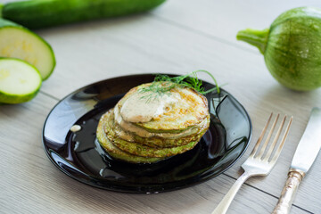 zucchini fried in batter with sauce