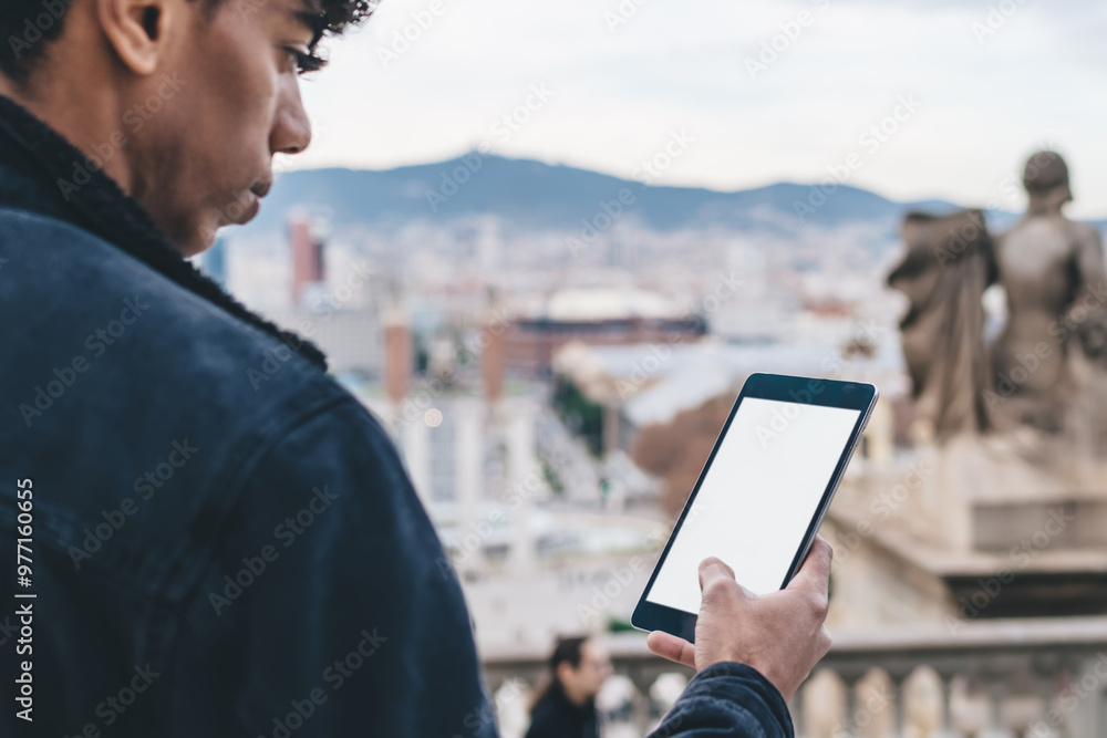 Poster handsome hipster guy tracking gps via location application on modern digital tablet with copy space 