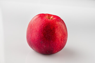Juicy Red Apple: Fresh and Delicious Fruit Isolated on White Background