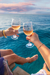 Wine in a glass on the seashore. Selective focus.