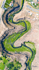 Amazing landscape mountains and river. Լittle river, mountains and animals. Aerial footage of a drone flying