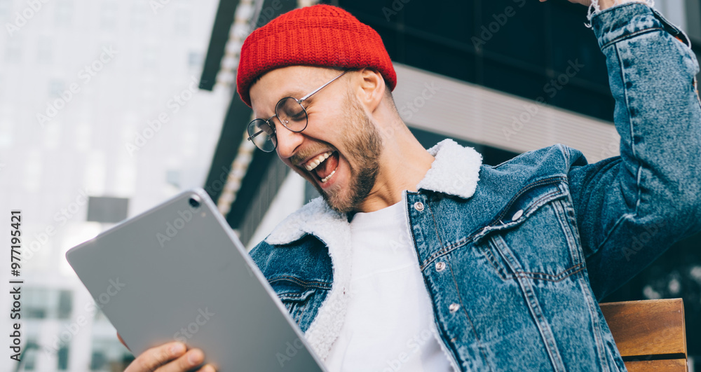 Poster overjoyed male blogger feeling excited from received report with online statistic of own web page ra