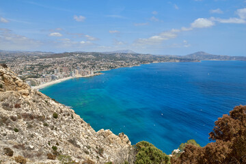 Breathtaking Panoramic View of Calpe's Turquoise Bay from Majestic Cliffside Overlooking Iconic...