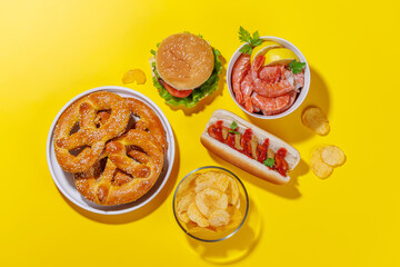 A vibrant photo showcasing various beer snacks and fast food