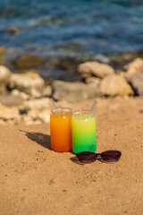 Two cocktails by the sea. Selective focus.