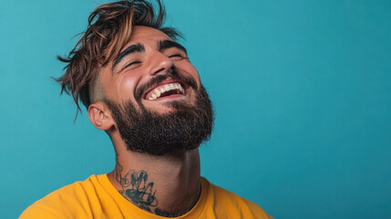 Happy Male Student,  A joyful young man with a stylish haircut and beard laughs heartily, showcasing his positive mood and satisfaction with life