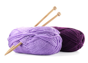 Two bright yarns and knitting needles isolated on white