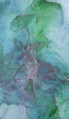 Abstract teal and green watercolor texture showcasing fluid shapes and intricate patterns created...