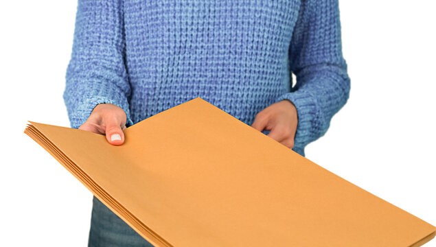 young woman holding, holding out a converter isolated on a white background