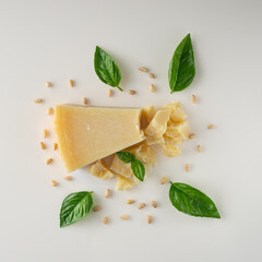 Authentic Italian Parmigiano Reggiano: Aged Cheese Wedge Isolated on White Background