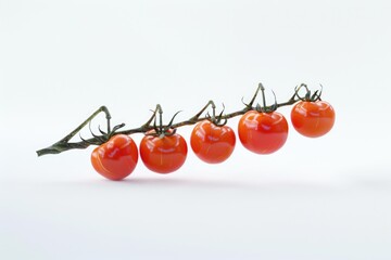 Fresh cherry tomatoes growing on a tree branch