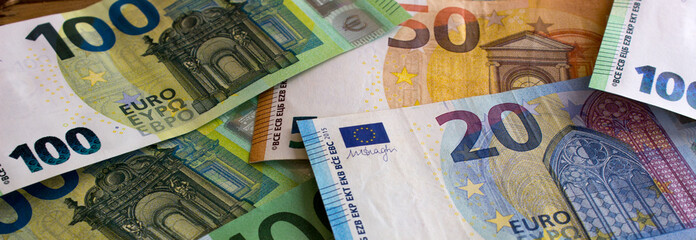 Euro money and coins close-up. The national currency of the European Union