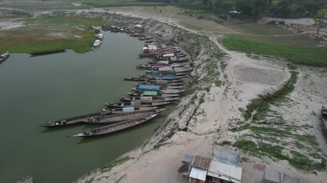 Aerial view of local boats anchored in Kalitola ghat, Sariakandi, Bangladesh