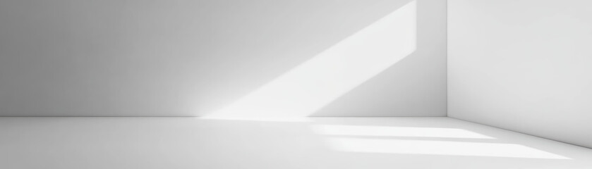 Bright sunlight casts sharp shadows in a minimalistic, empty white room with clean lines. Perfect for design, architecture, or concept visuals.