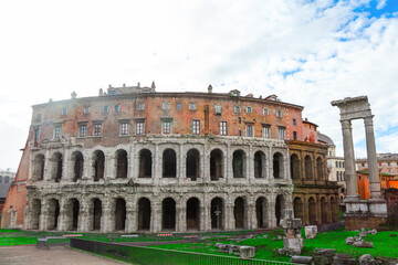 Teatro di Marcello in Rome Italy. Roman Empire architecture with arched windows and a large archway