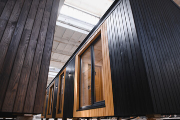 Production of new wooden modular houses. Construction site