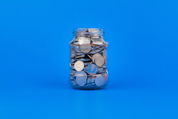 Saving Coins in Glass Bottle Financial Plan and Investment, Creating Financial Security and Asset...
