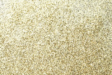Beautiful shiny golden glitter as background, top view