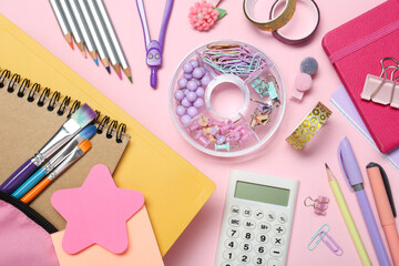 Backpack and different school stationery on pink background, flat lay