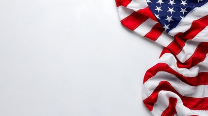 Fototapeta premium A clean white background with the American flag draped along the edge, leaving space for copy.