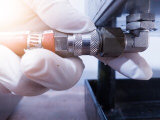 Check and repair coupler hose air supply to machinery.