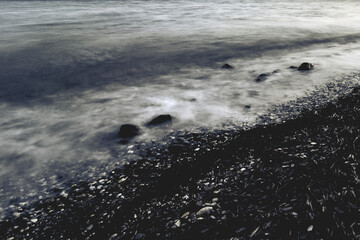 waves breaking on the beach
