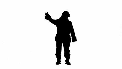 Christmas and New Year holidays concept. Black silhouette of a man in Santa Claus costume on white isolated background. Santa Claus is making a hand gesture come here.