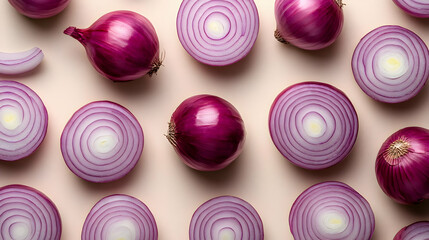 Fresh purple onions arranged artistically on a light background, showcasing vibrant colors and intricate internal layers.